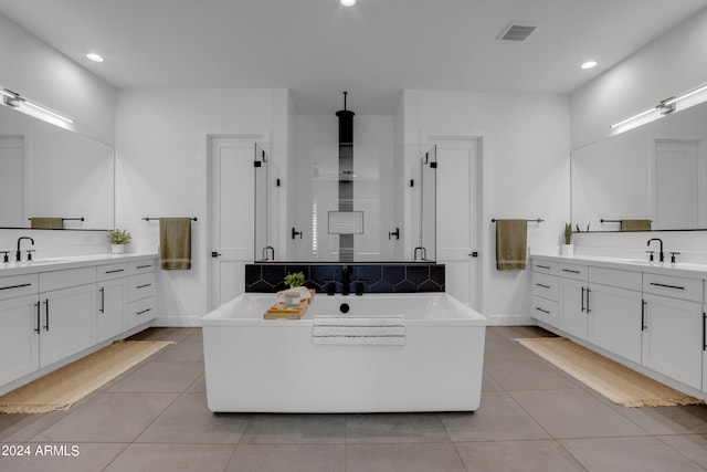 bathroom featuring vanity, separate shower and tub, and tile patterned floors