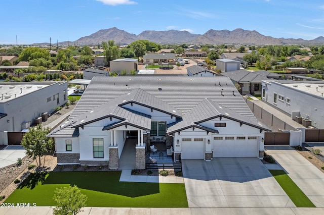 exterior space featuring a mountain view and a garage