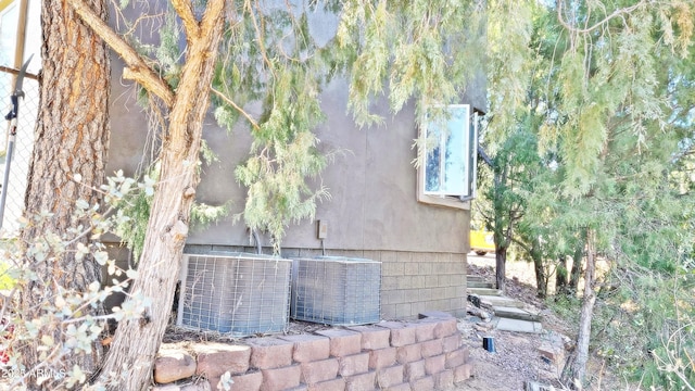 view of property exterior with cooling unit