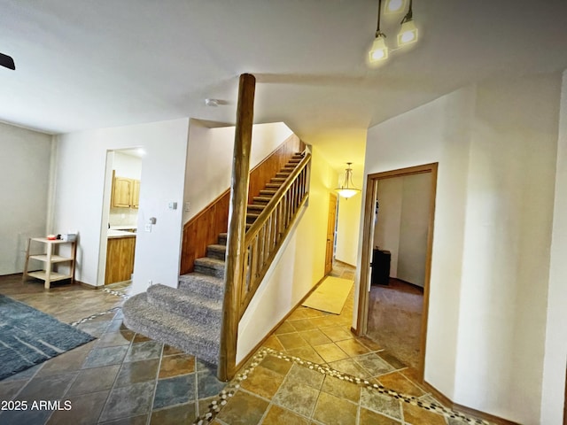 stairway with stone finish floor