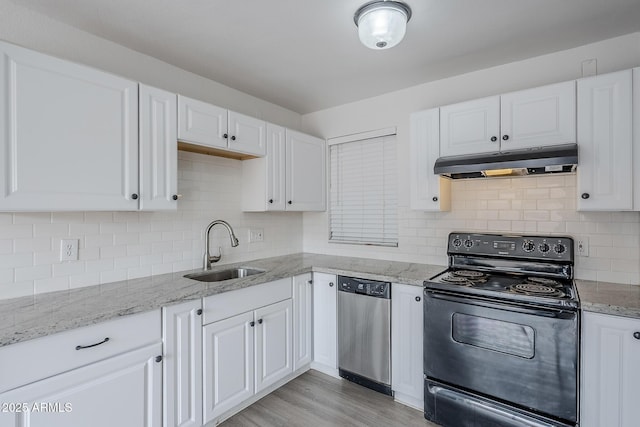 kitchen featuring black electric range, dishwasher, a sink, under cabinet range hood, and white cabinetry