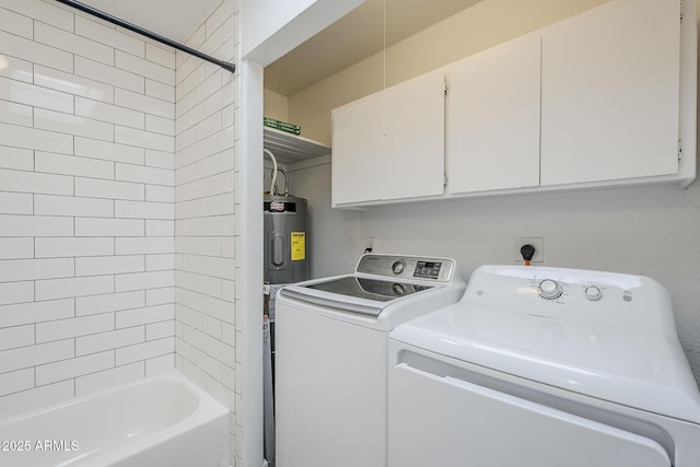 laundry room with electric water heater, cabinet space, and washing machine and clothes dryer