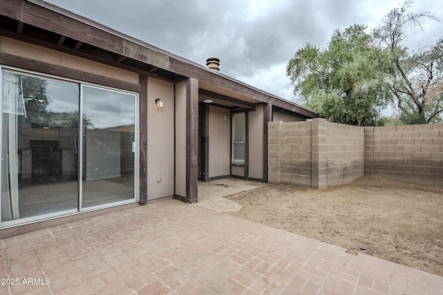 view of patio / terrace with fence