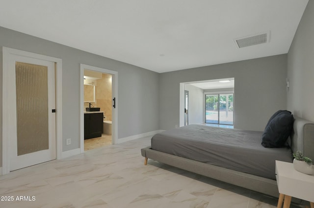 bedroom featuring marble finish floor, baseboards, visible vents, and connected bathroom