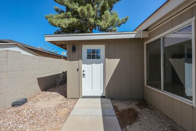 property entrance featuring fence