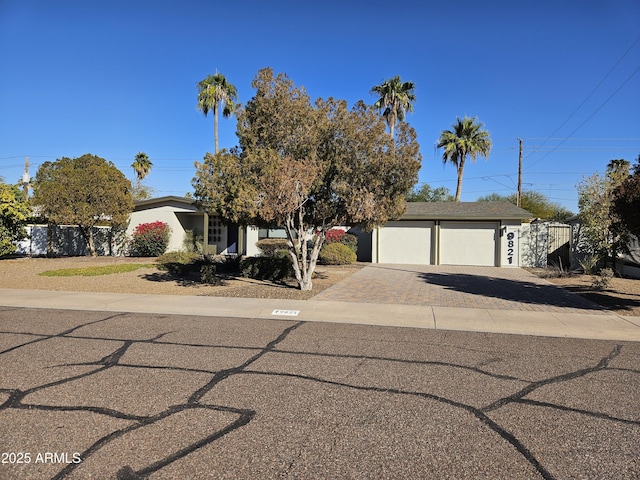 view of front of home featuring a garage