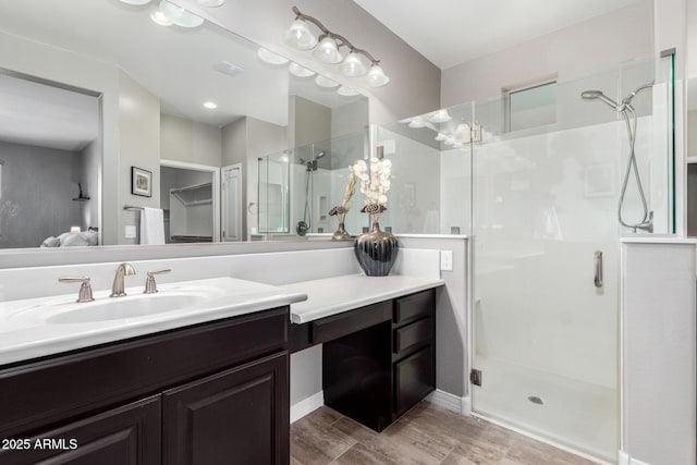 full bathroom with ensuite bathroom, a stall shower, and vanity