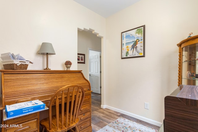 office with hardwood / wood-style flooring