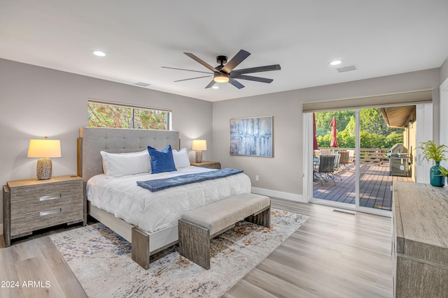 bedroom featuring light wood-type flooring, ceiling fan, and access to exterior