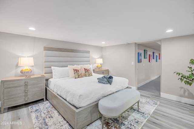 bedroom featuring light wood-type flooring