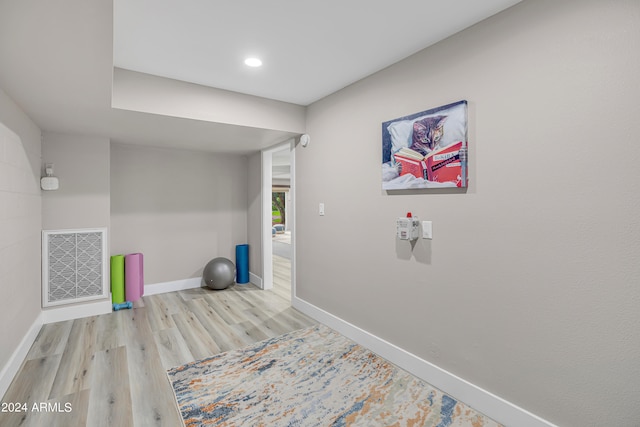 laundry area featuring light hardwood / wood-style flooring