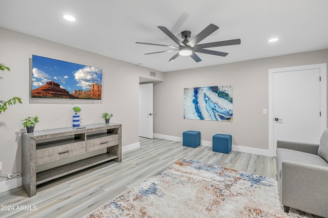 interior space featuring light hardwood / wood-style floors and ceiling fan