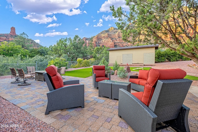 view of patio featuring a mountain view and outdoor lounge area