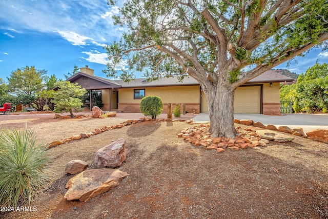 view of front of property featuring a garage