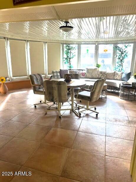 dining area with tile patterned floors