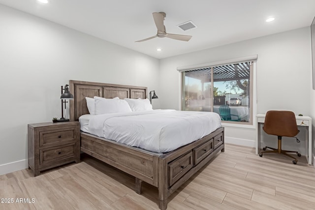 bedroom featuring light hardwood / wood-style flooring and ceiling fan