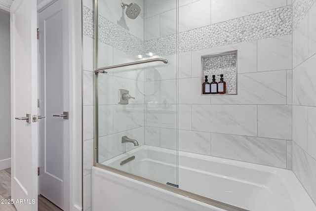 bathroom featuring enclosed tub / shower combo