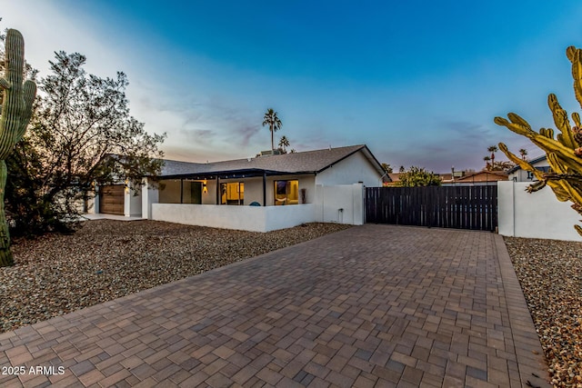 view of property exterior at dusk