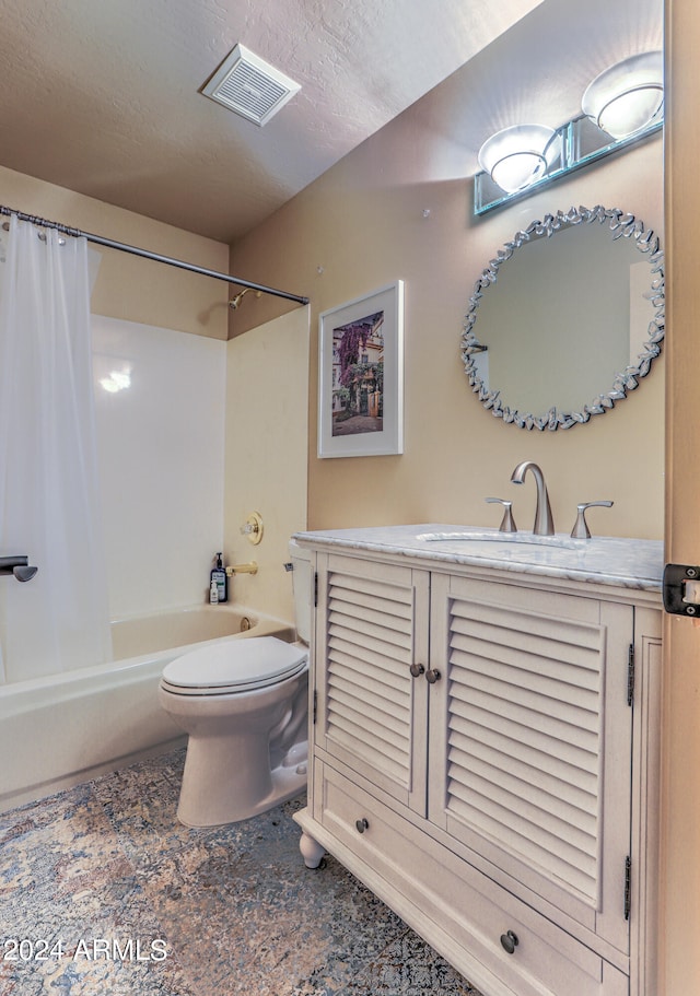 full bathroom with shower / bath combo, toilet, tile floors, and vanity