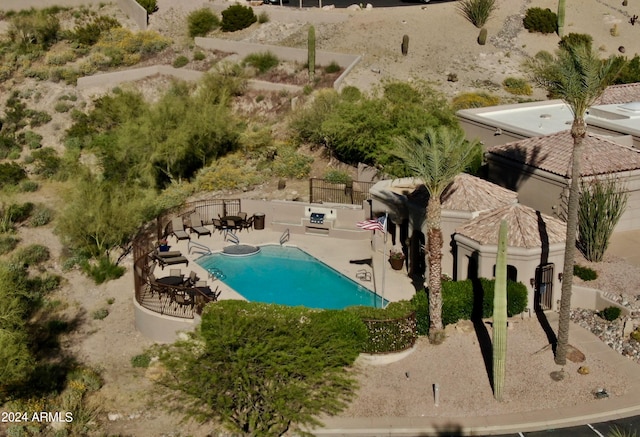 view of pool featuring a patio