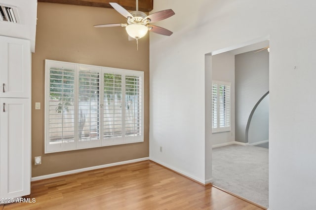 2053 W Natal Cir, Mesa, AZ 85202 - empty room featuring ceiling fan and light wood-type flooring