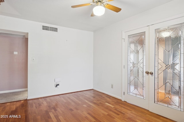 2053 W Natal Cir, Mesa, AZ 85202 - empty room featuring wood finished floors and ceiling fan