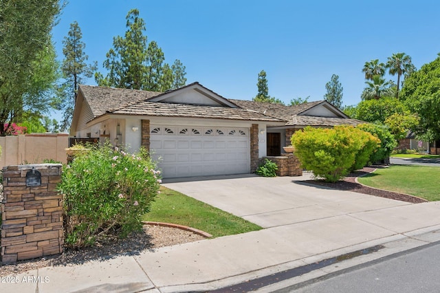 2053 W Natal Cir, Mesa, AZ 85202 - single story home with a garage, concrete driveway, and stucco siding