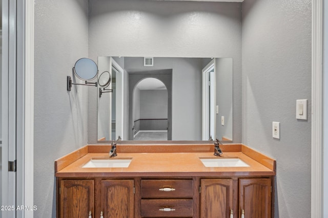 2053 W Natal Cir, Mesa, AZ 85202 - bathroom featuring a textured wall and double vanity