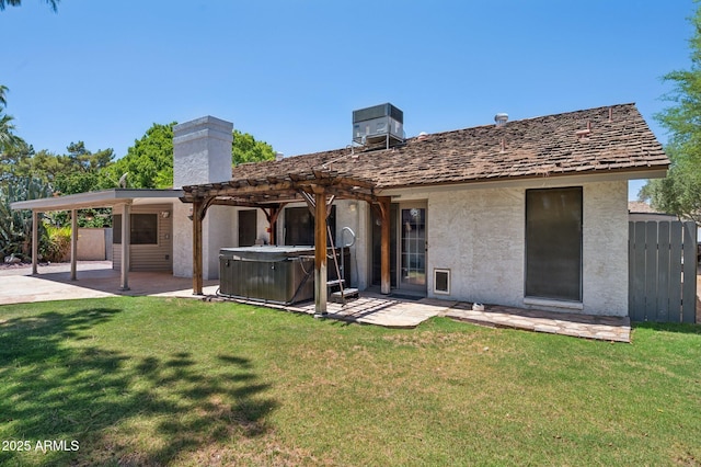 2053 W Natal Cir, Mesa, AZ 85202 - rear view of house featuring a hot tub, a patio, a pergola, and stucco siding