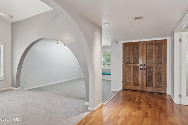 2053 W Natal Cir, Mesa, AZ 85202 - foyer with arched walkways and wood finished floors