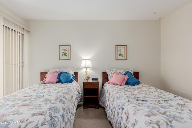 bedroom with light colored carpet