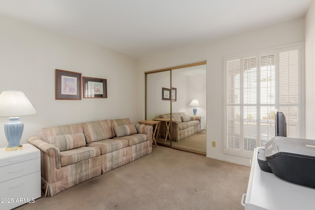 living room featuring light carpet