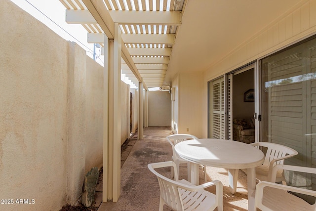 view of patio featuring fence and a pergola