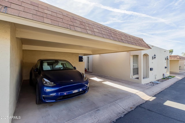 exterior space with an attached carport