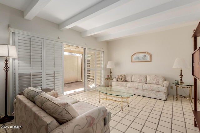 living area with beamed ceiling