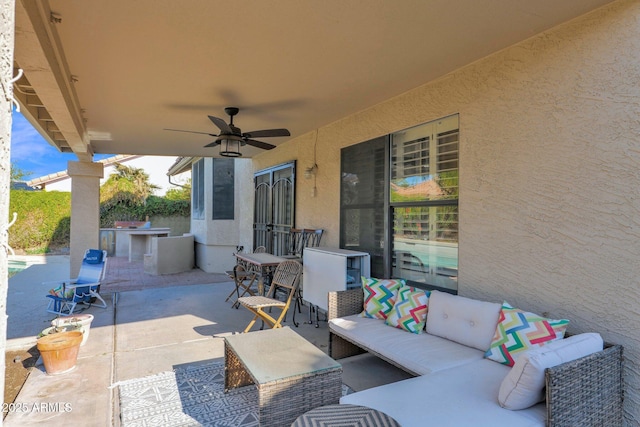 view of patio / terrace featuring outdoor lounge area and ceiling fan