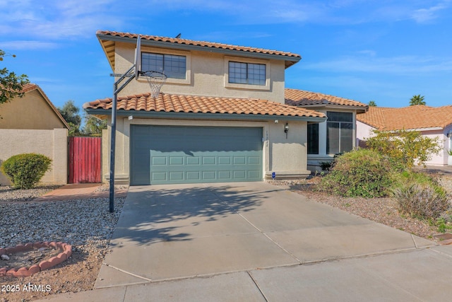 mediterranean / spanish-style house featuring a garage