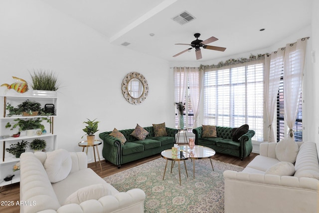 living room featuring ceiling fan and hardwood / wood-style floors