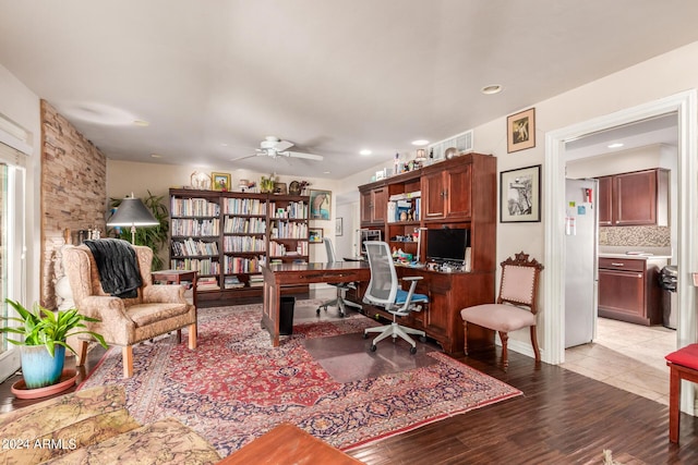 office featuring recessed lighting, light wood-style floors, and a ceiling fan