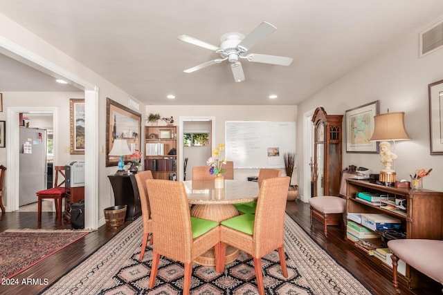 dining room featuring hardwood / wood-style flooring, ceiling fan, visible vents, and recessed lighting