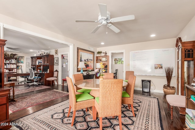 dining room featuring ceiling fan and hardwood / wood-style floors