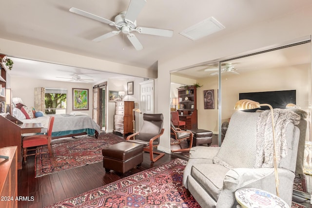 bedroom featuring wood-type flooring and a ceiling fan
