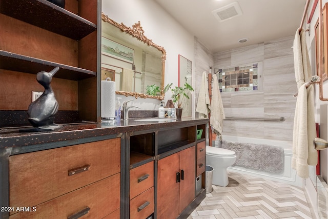 full bathroom featuring visible vents, vanity, and toilet