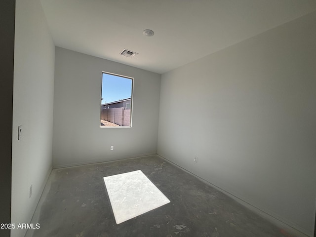 spare room featuring visible vents