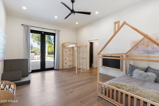 bedroom featuring access to outside, a ceiling fan, wood finished floors, and recessed lighting