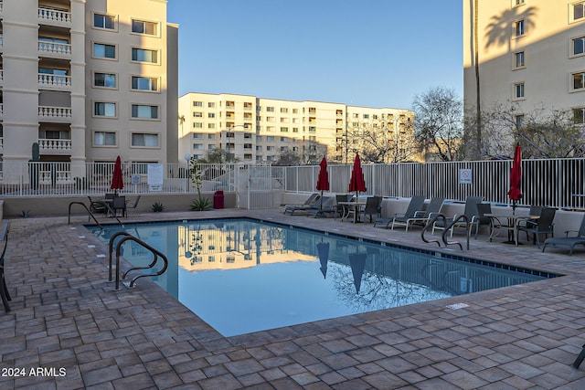 view of pool featuring a patio