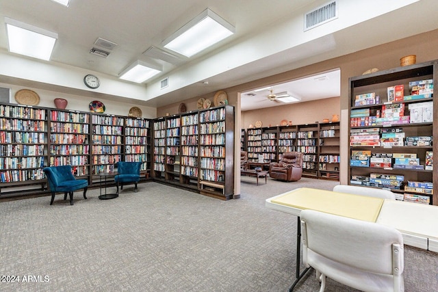 living area with carpet flooring