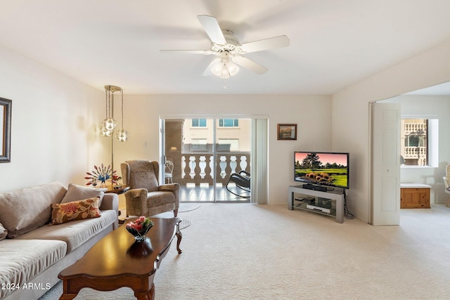 living room featuring ceiling fan and light carpet