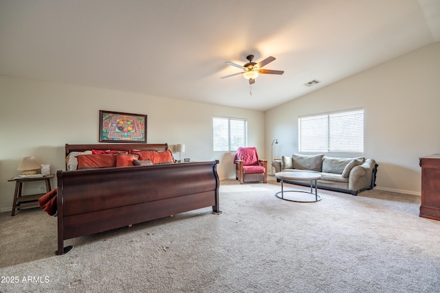 bedroom featuring lofted ceiling, carpet, and visible vents