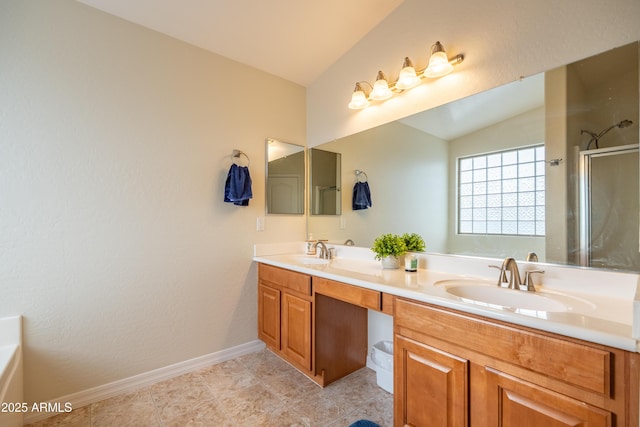 bathroom featuring lofted ceiling, double vanity, a sink, and an enclosed shower